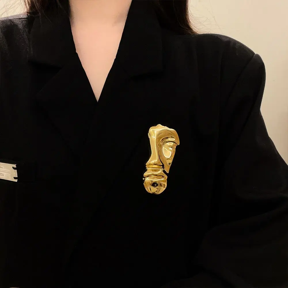 HALF FACE BROOCH 